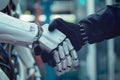 Cyber communication and robotic concepts. Robot and Engineerer human holding handshake Royalty Free Stock Photo