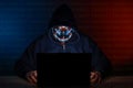 Cyber crime black hat hacker with hoodie and mask - Internet security concept Royalty Free Stock Photo