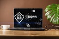 Cyber internet security concept. Blank screen laptop, sign general data protection regulation GDPR and shield with key icon