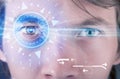 Cyber man with technolgy eye looking into blue iris