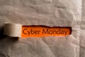 Cyber Monday - message appearing behind ripped brown paper. Best online shopping time. Day with biggest Sale. Mockup