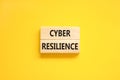 Cyber resilience symbol. Concept word Cyber resilience typed on wooden blocks. Beautiful yellow table yellow background. Business Royalty Free Stock Photo