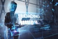 Cyber security and hacking concept with faceless theft in hoody using laptop and digital white glowing loading sign in virtual Royalty Free Stock Photo