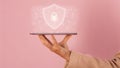 Cyber Security-Digital device security displayed on a tablet held by a hand, protection concept Royalty Free Stock Photo