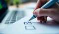Checklist and Pen on Survey Form with Laptop in Office Setting Royalty Free Stock Photo