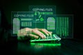 Hacker initiating file-transfer with binary code background. Royalty Free Stock Photo