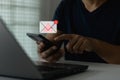 Cyber security threat and online fraud concept. Fraud email spam icon, phishing scam alert on smartphone. Royalty Free Stock Photo