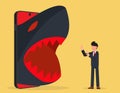 Cyber victim. angry shark attacking sad businessman via smartphone