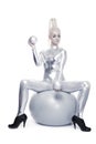 Cyber woman sitting on a silver ball Royalty Free Stock Photo