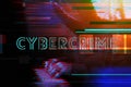 Cybercrime concept with hooded hacker typing computer keyboard Royalty Free Stock Photo