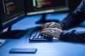 Hacker using computer virus for cyber attack