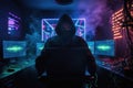 Cybercriminal: A dark, hooded hacker hacks into a computer system, threatening data security