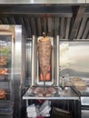 Kebab or shawarma is sold by hawkers in small roadside shops as a takeaway dish. Royalty Free Stock Photo