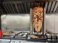 Kebab or shawarma is sold by hawkers in small roadside shops as a takeaway dish. Royalty Free Stock Photo