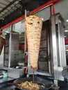 Kebab or shawarma is sold by hawkers in small roadside shops as a takeaway dish. Royalty Free Stock Photo