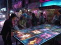 Cyberpunk artist selling holographic art