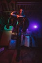 Cyberpunk female cosplay with neon lighting. A girl in a steampunk costume