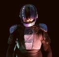 Cyberpunk future concept. Portrait of bionic cyborg police officer in dark. Halfman robot looks at camera. Futuristic science Royalty Free Stock Photo