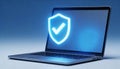 Cybersecurity concept, digital shield icon glowing over laptop, blue tones, professional corporate style, modern minimalistic Royalty Free Stock Photo