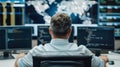 A Cybersecurity Analyst Monitoring Cybersecurity Data on Multiple Computers in High-Tech Control Room with World Map