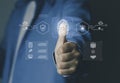 cybersecurity, authentication, and secure digital access control. Businessman using fingerprint biometric scan, shield protection Royalty Free Stock Photo