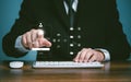 Cybersecurity cloud network systerm privacy protect data concept, Businessman using computer and touching fingerprint to scan