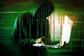 Cybersecurity, computer hacker with hoodie Royalty Free Stock Photo