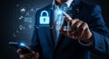 Cybersecurity concept with data protection and encryption using modern technology interface and smartphone in hand Royalty Free Stock Photo
