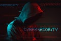 Cybersecurity concept with faceless hooded male person Royalty Free Stock Photo