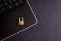 Cybersecurity concept, padlock on laptop computer keyboard Royalty Free Stock Photo