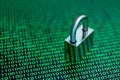Cybersecurity concept with a padlock over binary code background. Royalty Free Stock Photo