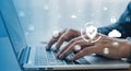 Cybersecurity and Data Protection - Man Typing on Laptop with Digital Security Icons Royalty Free Stock Photo