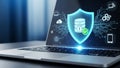 Cybersecurity Data Protection Shield on Laptop Screen. Digital Network Security Concept, Blue Background. Royalty Free Stock Photo