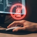 Cybersecurity and Data Risk Concept: A Person Using a Computer with an Unsafe Usage Warning on the Screen Royalty Free Stock Photo