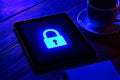 Cybersecurity and Digital Privacy Protection on Tablet Screen Glowing Blue Lock Icon Royalty Free Stock Photo