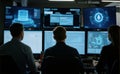 Cybersecurity Team Analyzing Data in High-Tech Command Center Royalty Free Stock Photo
