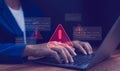 Cybersecurity warning concept. Warning icon and programming code. Data breach, system error, hacking attempt, software development Royalty Free Stock Photo