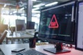 Cybersecurity warning sign on a computer screen