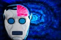 Cyborg artificial intelligence concept illustration. Closeup of robot head with cutoff of human like brain on abstract futuristic
