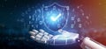 Cyborg hand holding a Shield web security concept 3d rendering Royalty Free Stock Photo