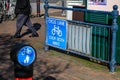 Cycle Lane Pedestrian Warning Sign Fixed To Blue Iron Railings Royalty Free Stock Photo