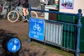 Cycle Lane Pedestrian Warning Sign Fixed To Blue Iron Railings Royalty Free Stock Photo
