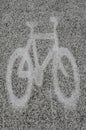 Cycle lane symbol road in bicycle pattern.