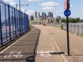 Cycle lane with white bycicle sign on tarmac Royalty Free Stock Photo