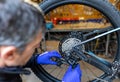 Cycle mechanist working on bike maintenance in workshop