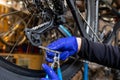 Cycle mechanist working on bike maintenance in workshop