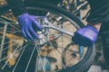 Cycle mechanist working on bike tires in workshop