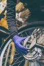 Cycle mechanist working on bike wheel in workshop