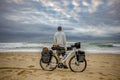 Cycle Packer with Bicycle on Beach Royalty Free Stock Photo