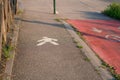 Cycle path with an area dedicated to people on foot, for runners, or those who walk, nearby there is the cycle path in red. Royalty Free Stock Photo